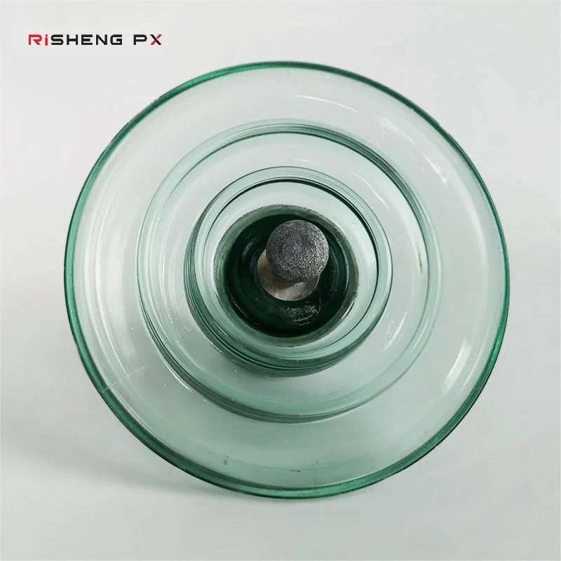 U40B glass disc insulator against a plain background