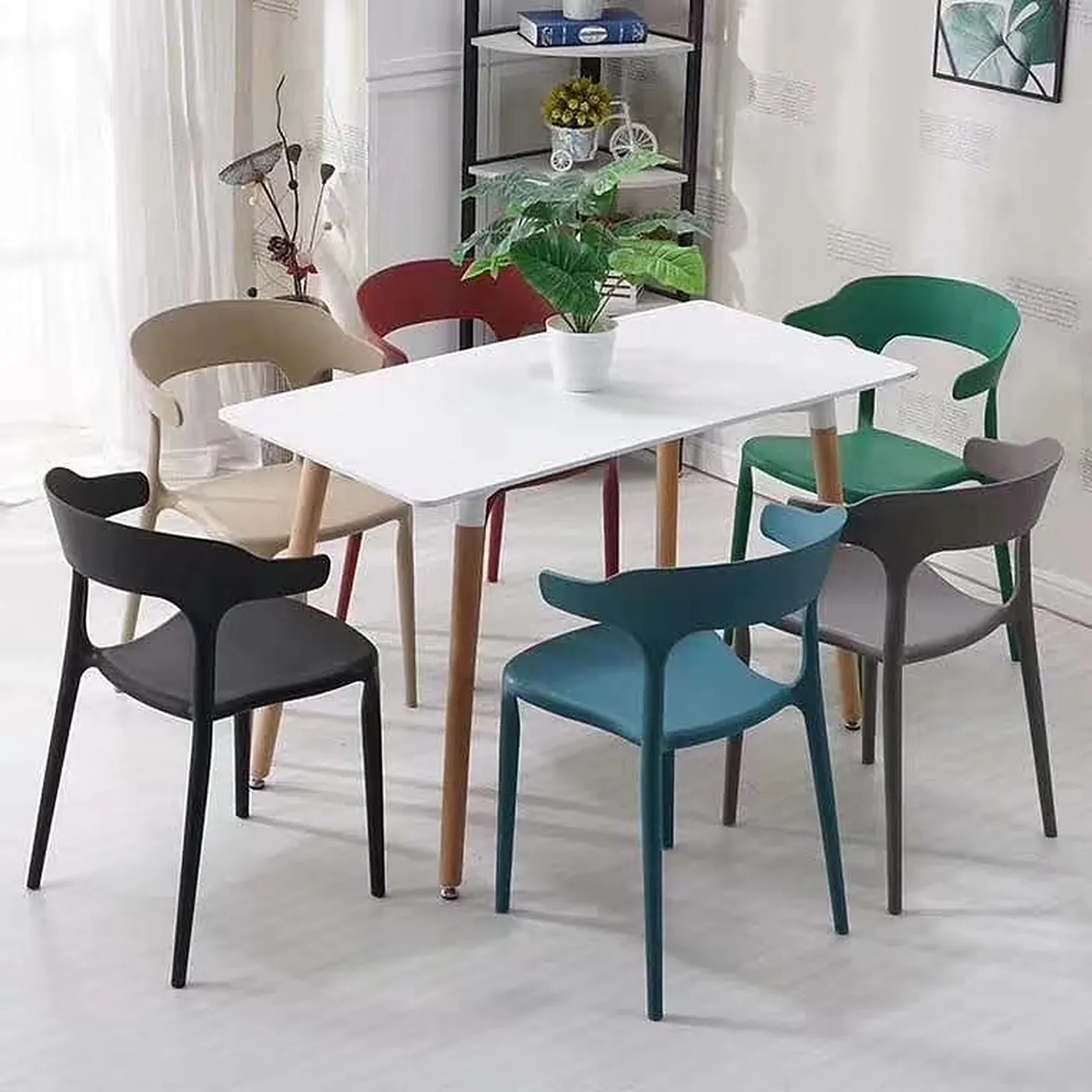 Plastic dining chairs and dining table set manufactured by Romance Furniture