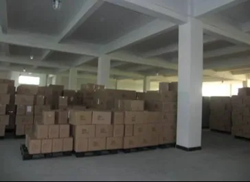 Finished goods stored on pallets in the warehouse before loading.