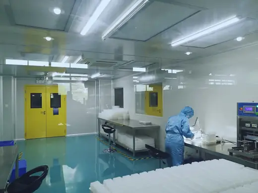 Clean room production area where medical components are molded and bagged without leaving the controlled space.