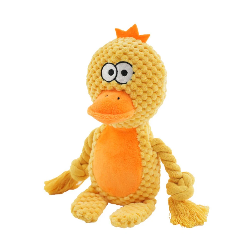 Yellow knitted plush duck toy with orange beak and rope arms on a white background