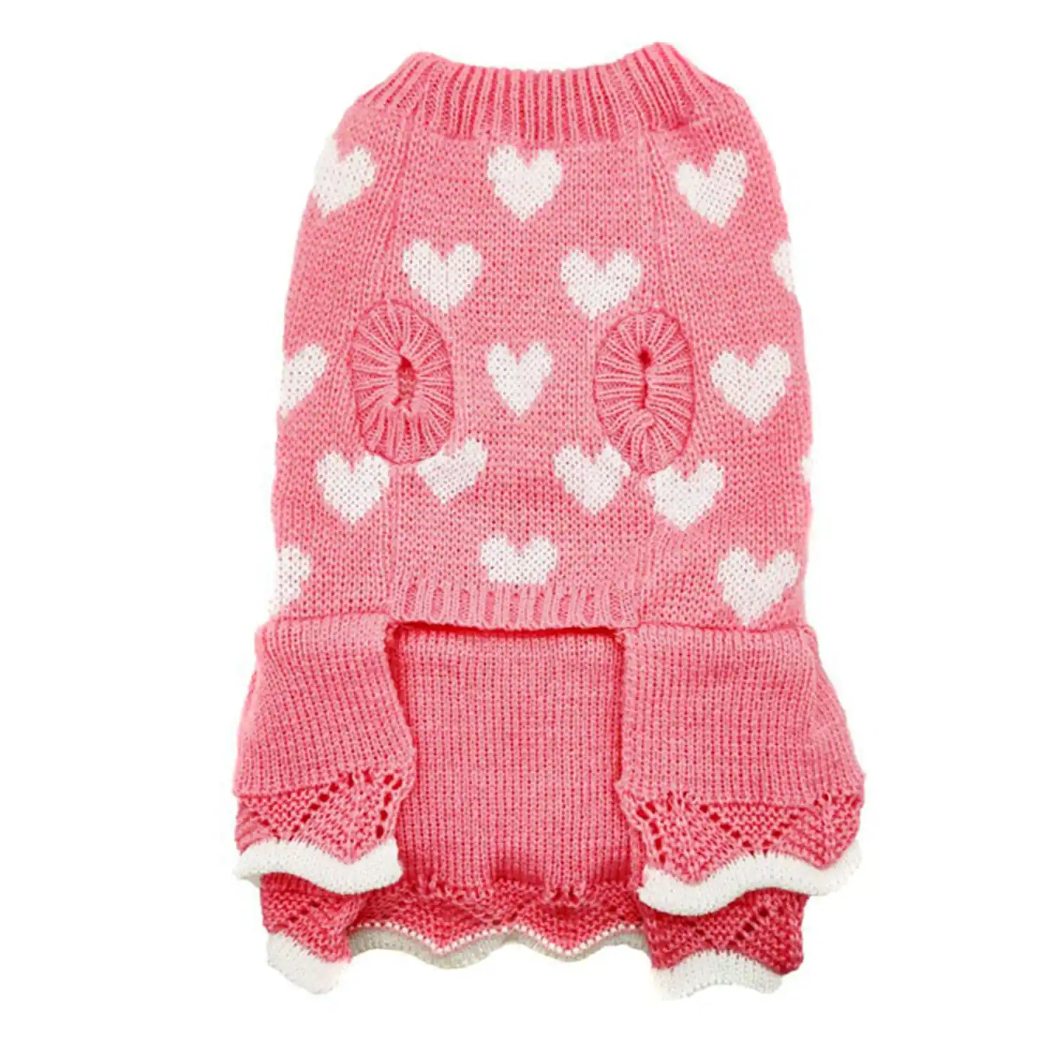 Pink knitted sweater with white hearts, textured circular accents, and a ruffled hem.