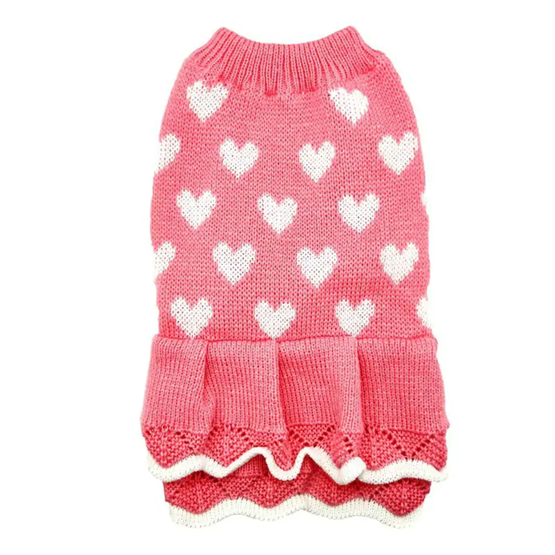 Pink knitted dog sweater with white heart patterns and a ruffled skirt hem.
