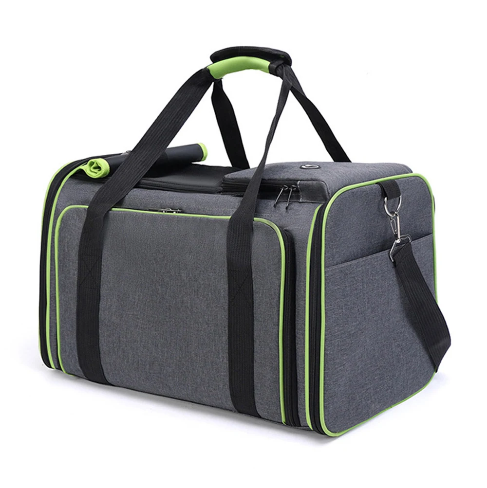 Grey duffel bag with lime green piping and black handles.