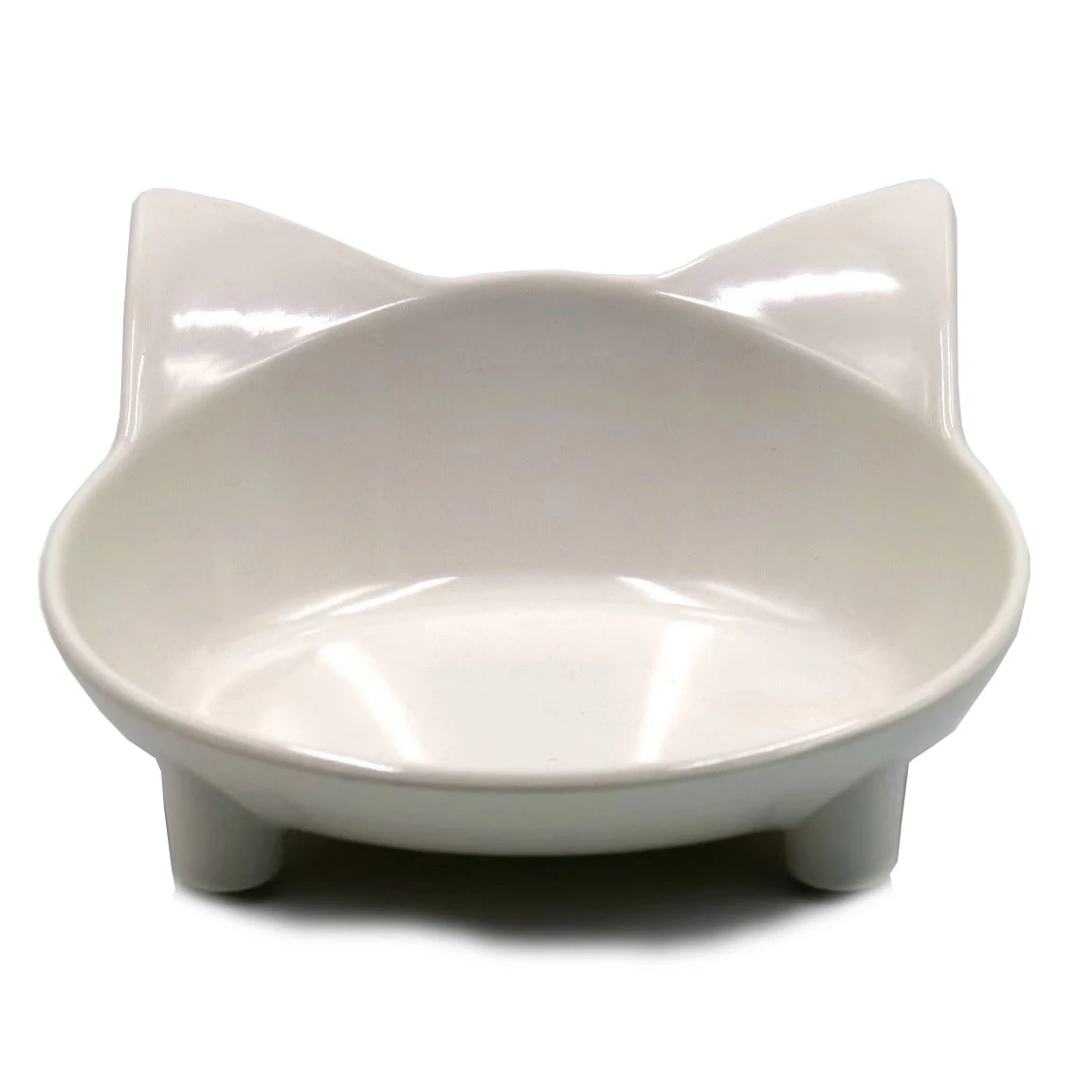 White ceramic cat-shaped bowl with raised ears and feet on a plain background