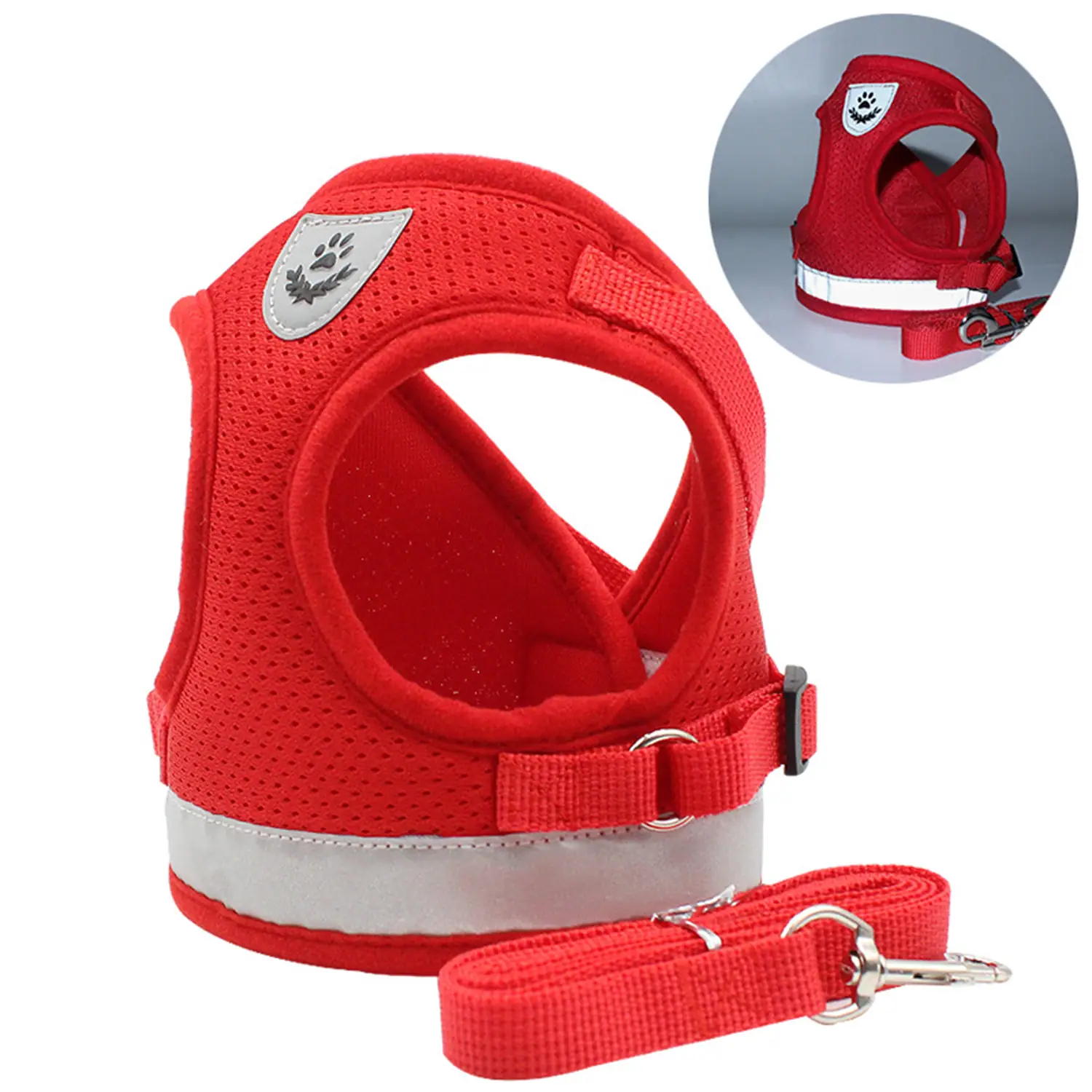 Red mesh dog harness with reflective strips and a matching red leash.