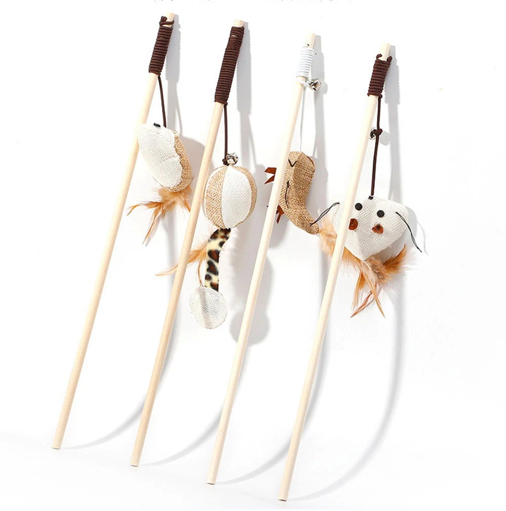Four wooden cat teaser wands with plush animal attachments and feathers on a white background