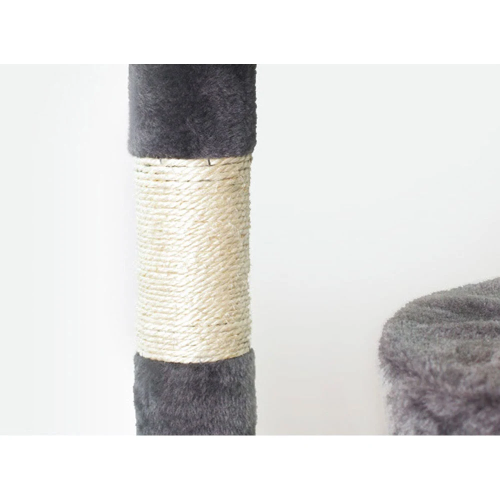 Close-up of a grey cat tree post wrapped with sisal scratching rope.