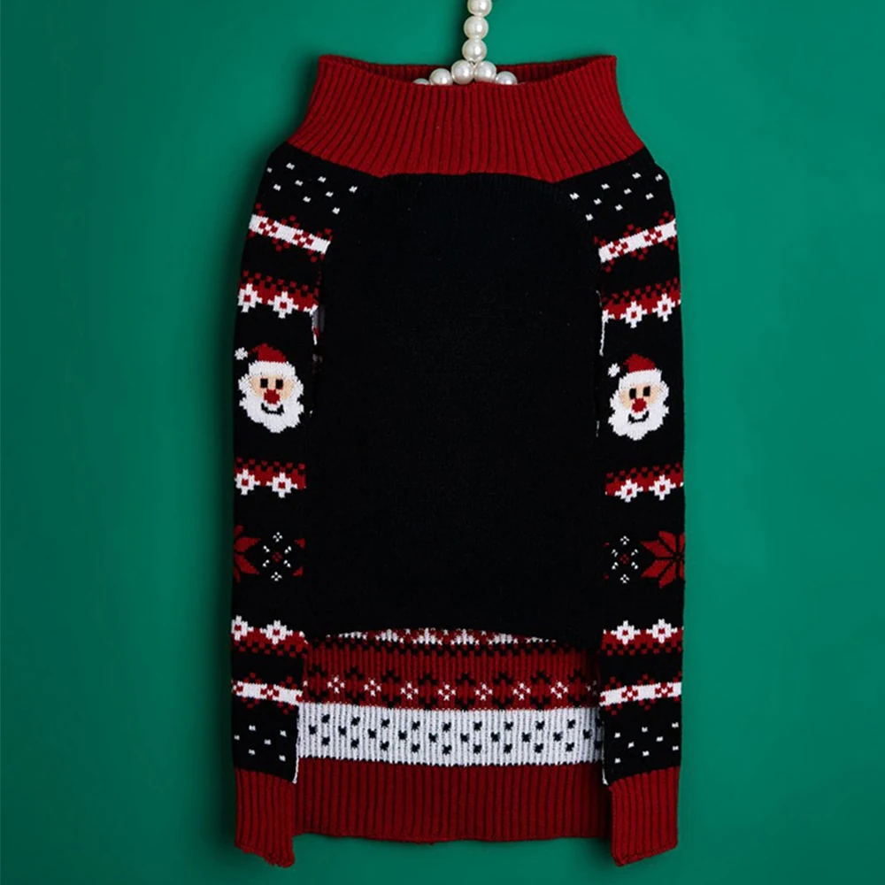 Black and red knitted sweater featuring a Santa face pattern hanging against a green background.