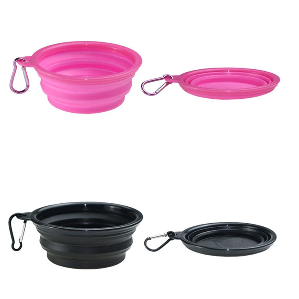 Pink and black collapsible silicone dog bowls shown in expanded and folded positions with carabiners