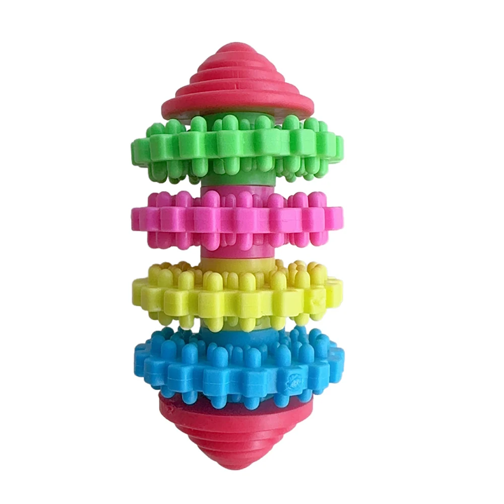 A colorful stacked toy with a red cone top, four rings of green, pink, yellow, and blue blocks, and a red cone bottom.