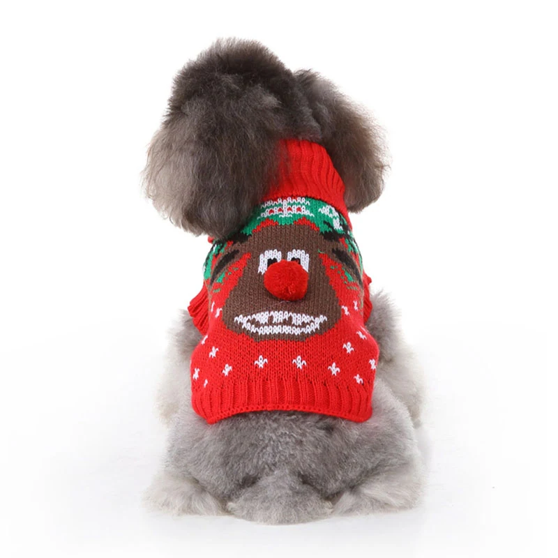 Back view of a gray poodle wearing a red knitted Christmas sweater with a reindeer face