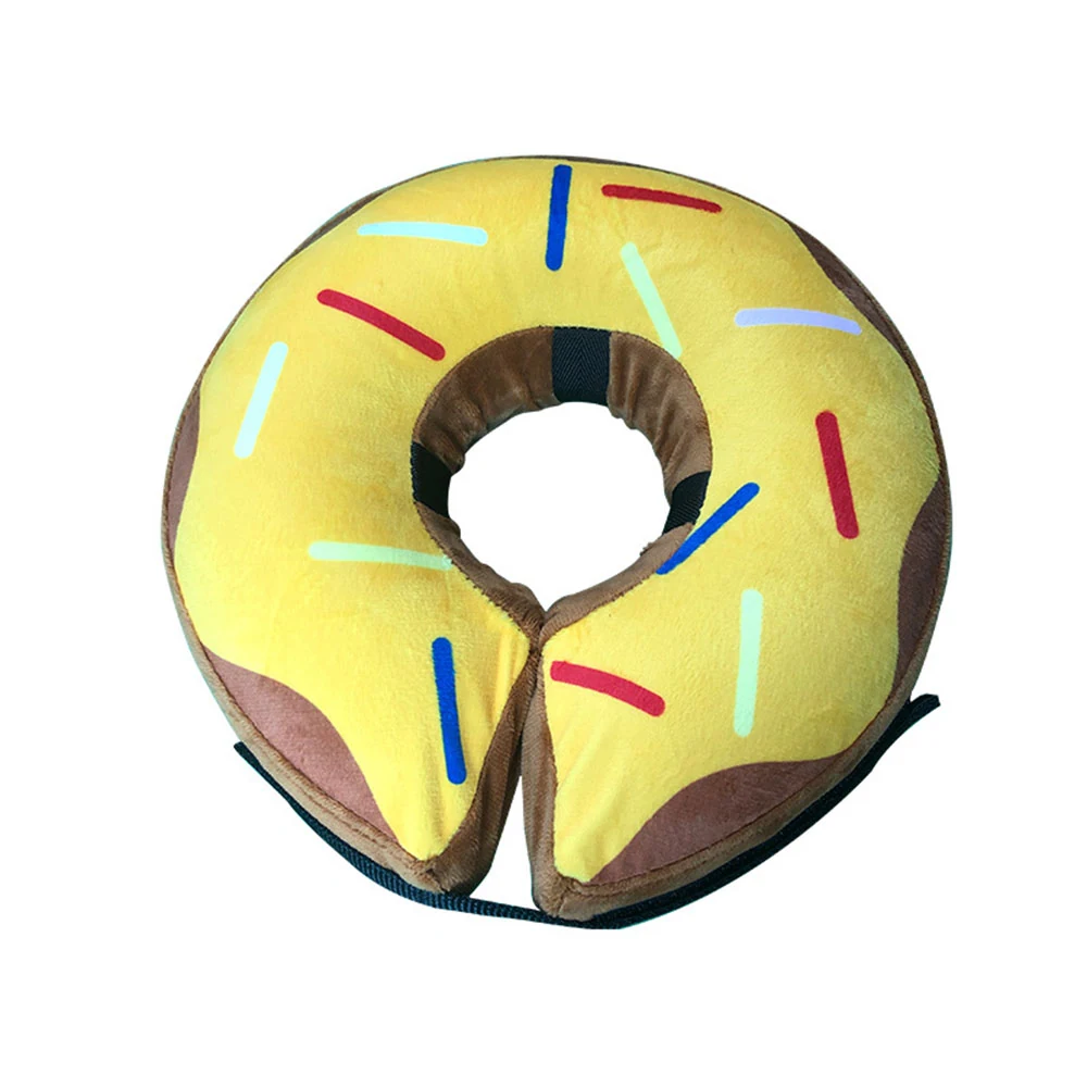Donut-shaped travel neck pillow with yellow icing and sprinkles