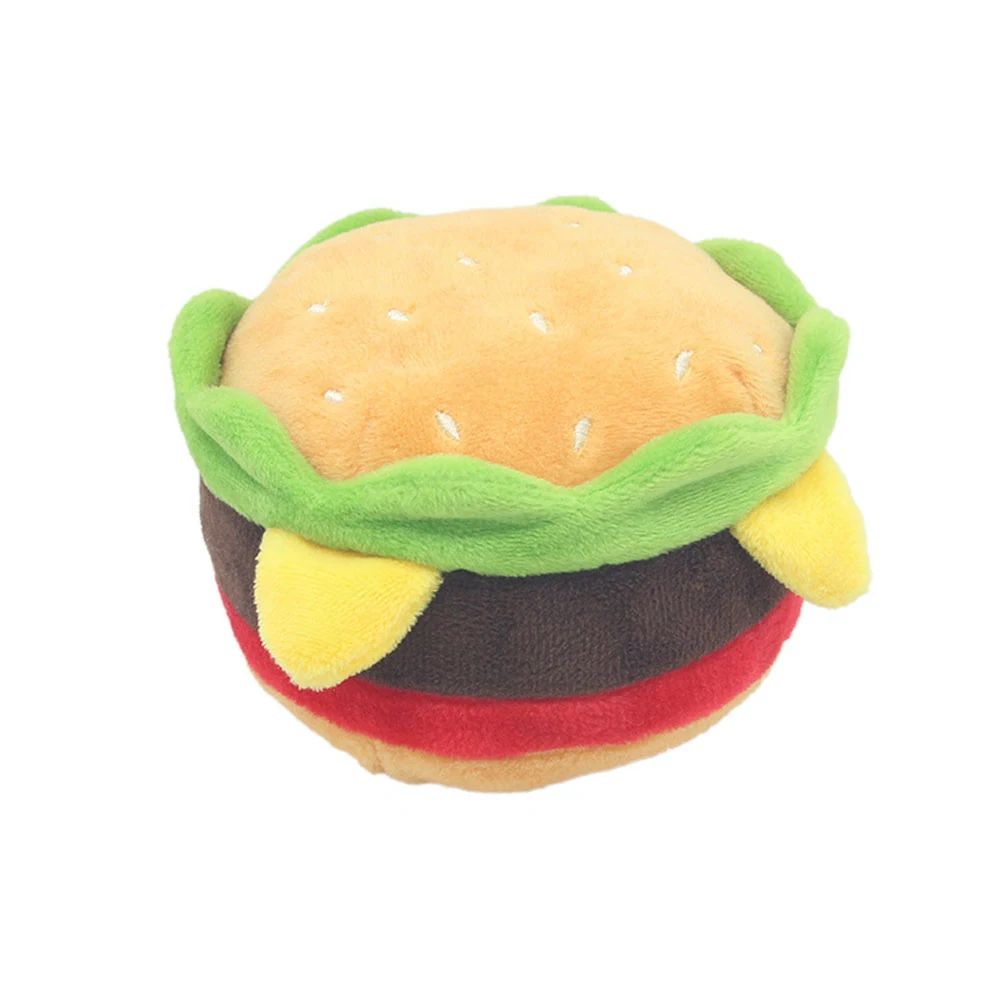 A plush toy shaped like a hamburger with a bun, lettuce, cheese, patty, and tomato.