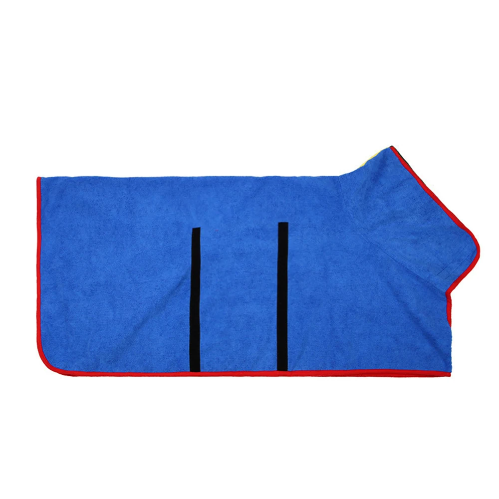 Blue fleece animal blanket with red trim and two black vertical straps laid flat on a white background