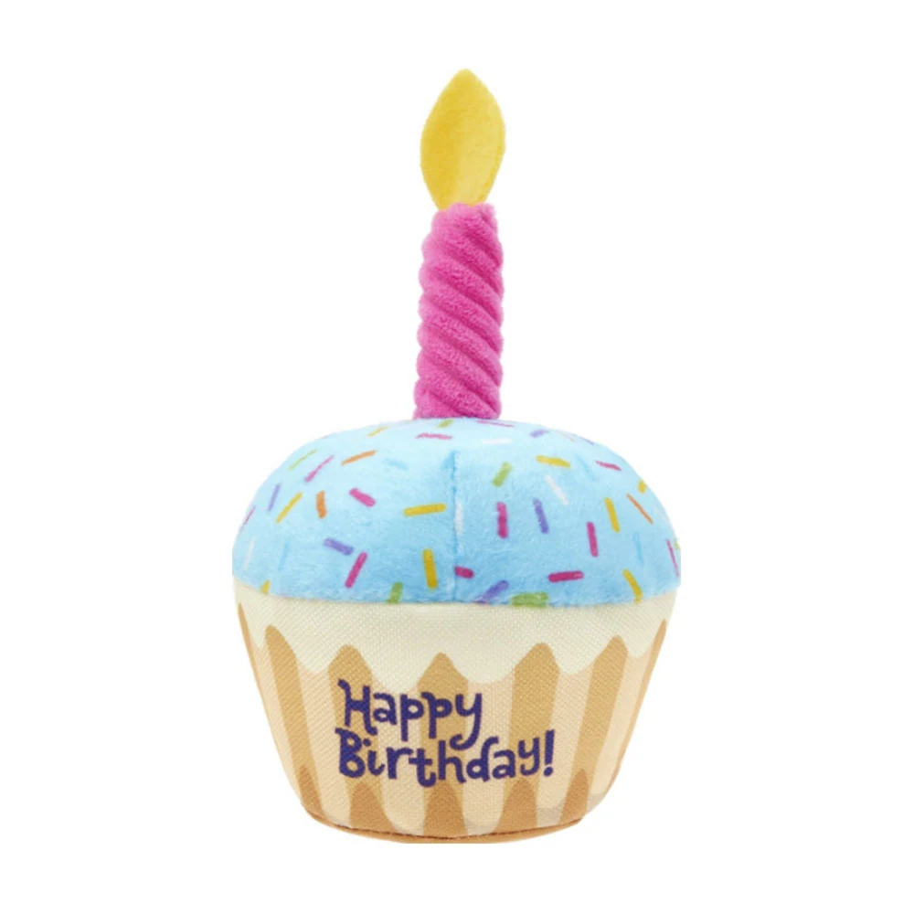 Plush cupcake toy with blue frosting, pink candle, and embroidered Happy Birthday text on a white background