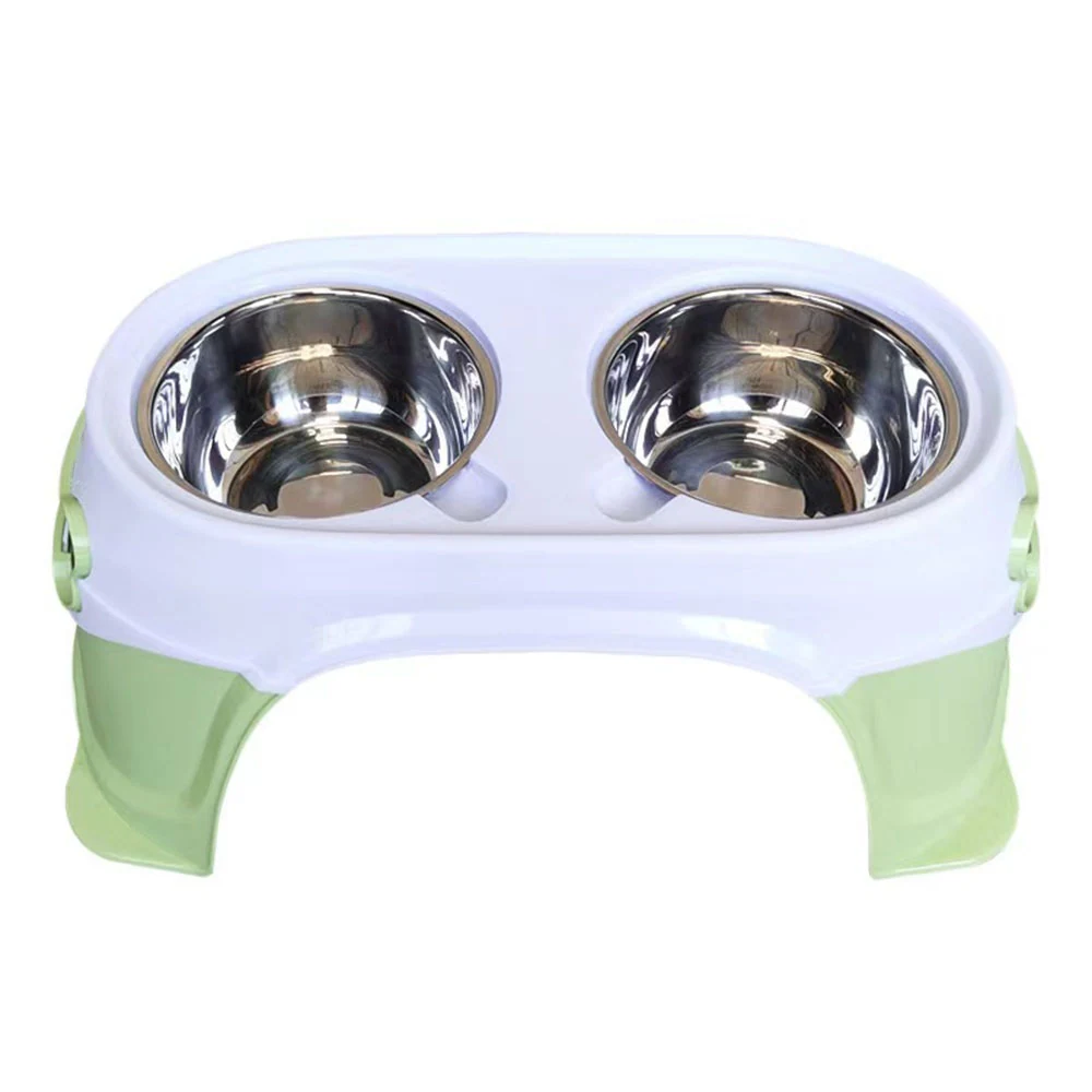 Elevated double dog bowl stand with white frame, light green legs, and two stainless steel bowls on white background