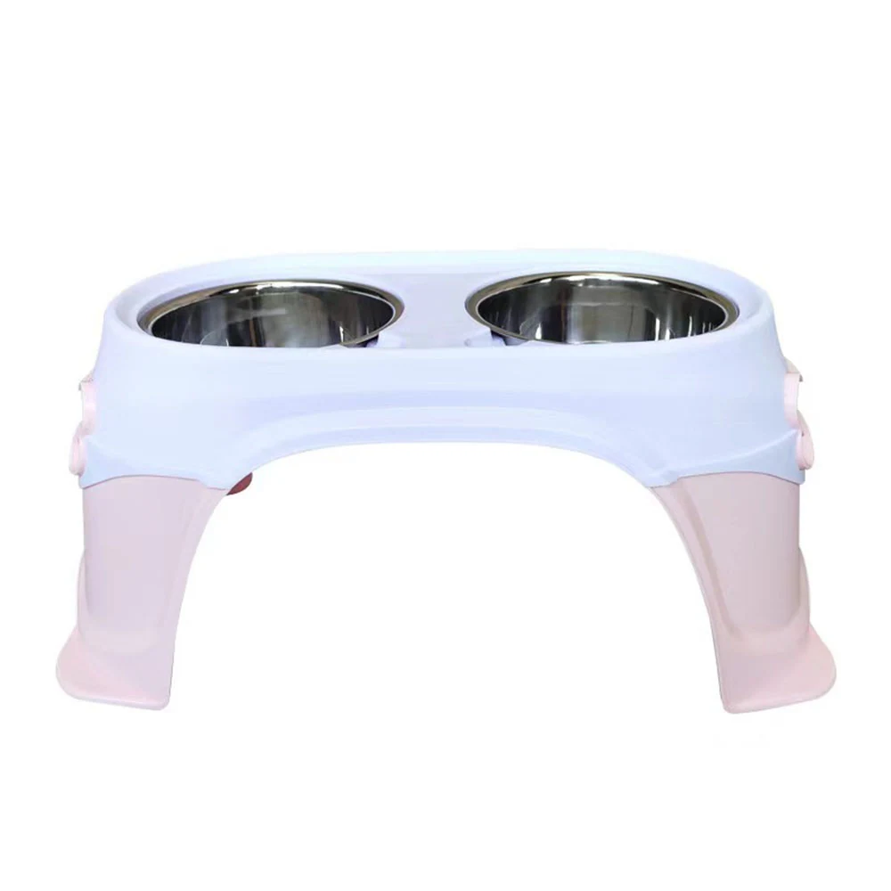 Elevated pet food stand with two stainless steel bowls in a white and pink holder