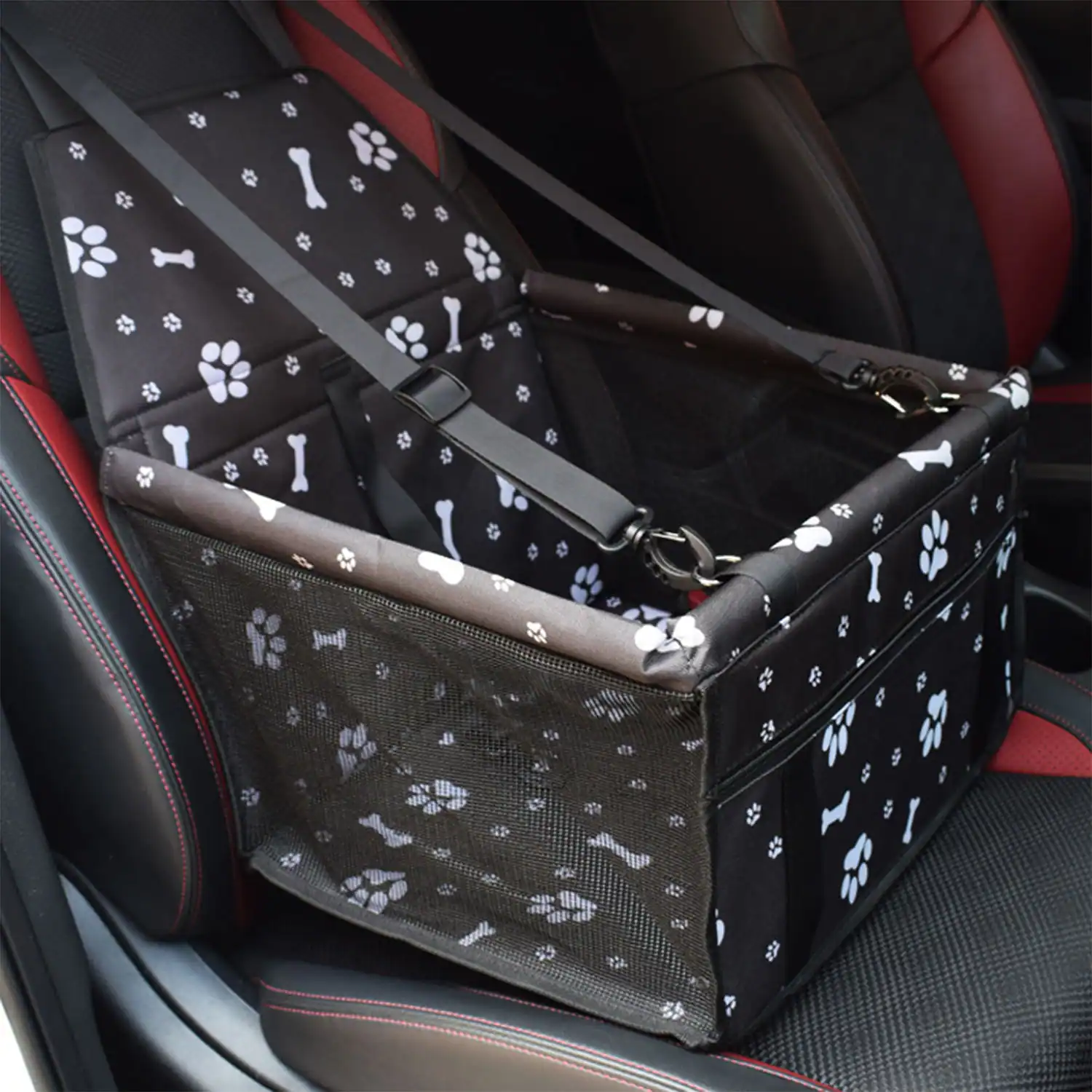 Black car seat pet carrier with white paw prints and mesh side panels