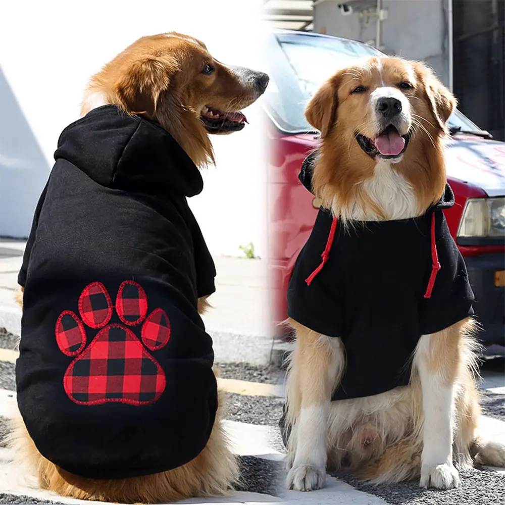 A split image of a golden retriever wearing a black hoodie with a red plaid paw print design.