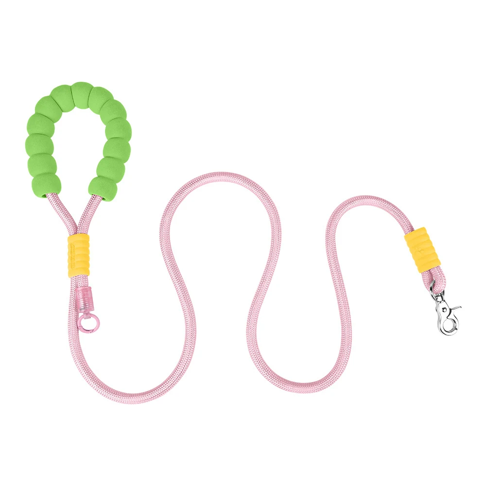 Pink dog leash with green foam handle and yellow accents