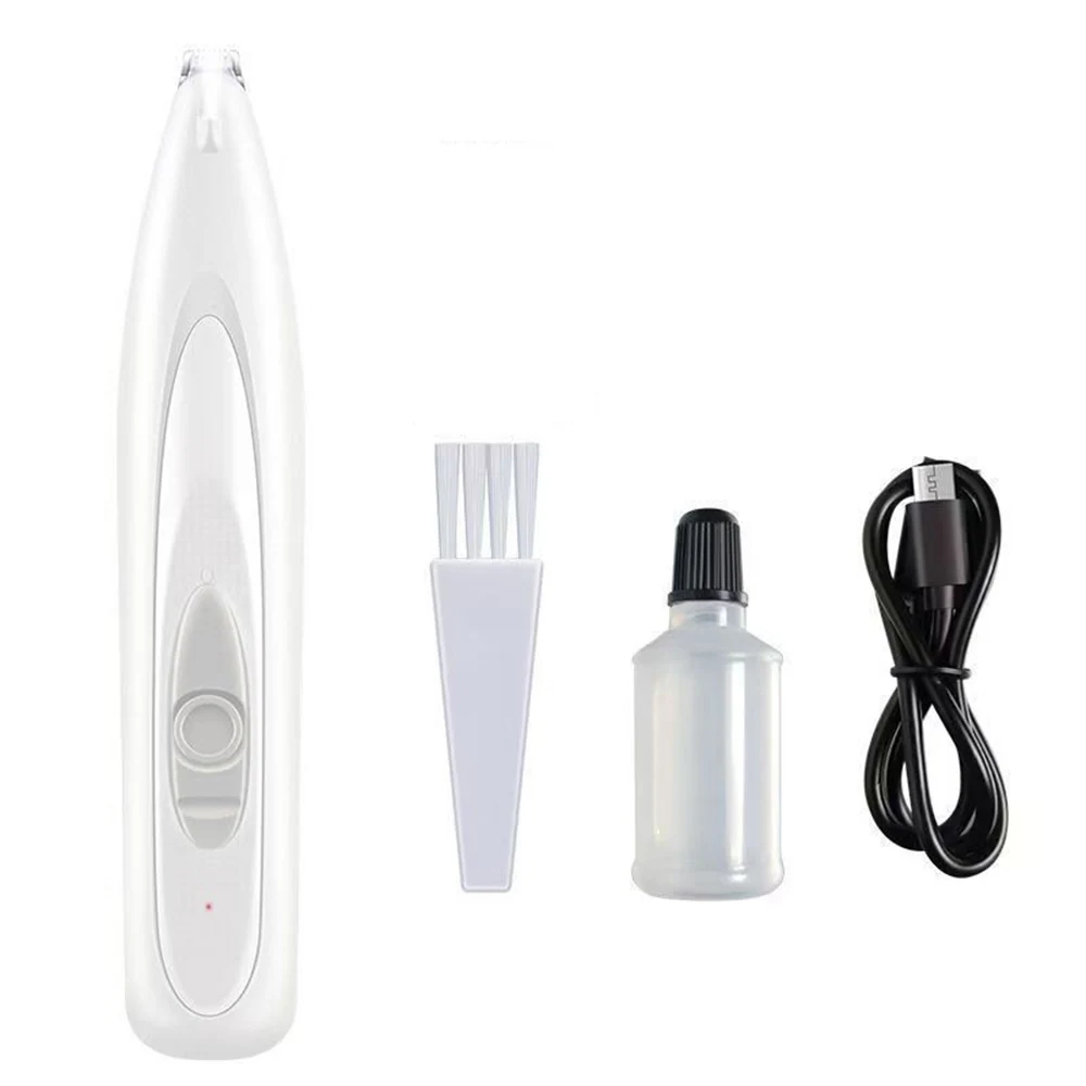 White electric grooming device with a cleaning brush, oil bottle, and USB charging cable on a white background.