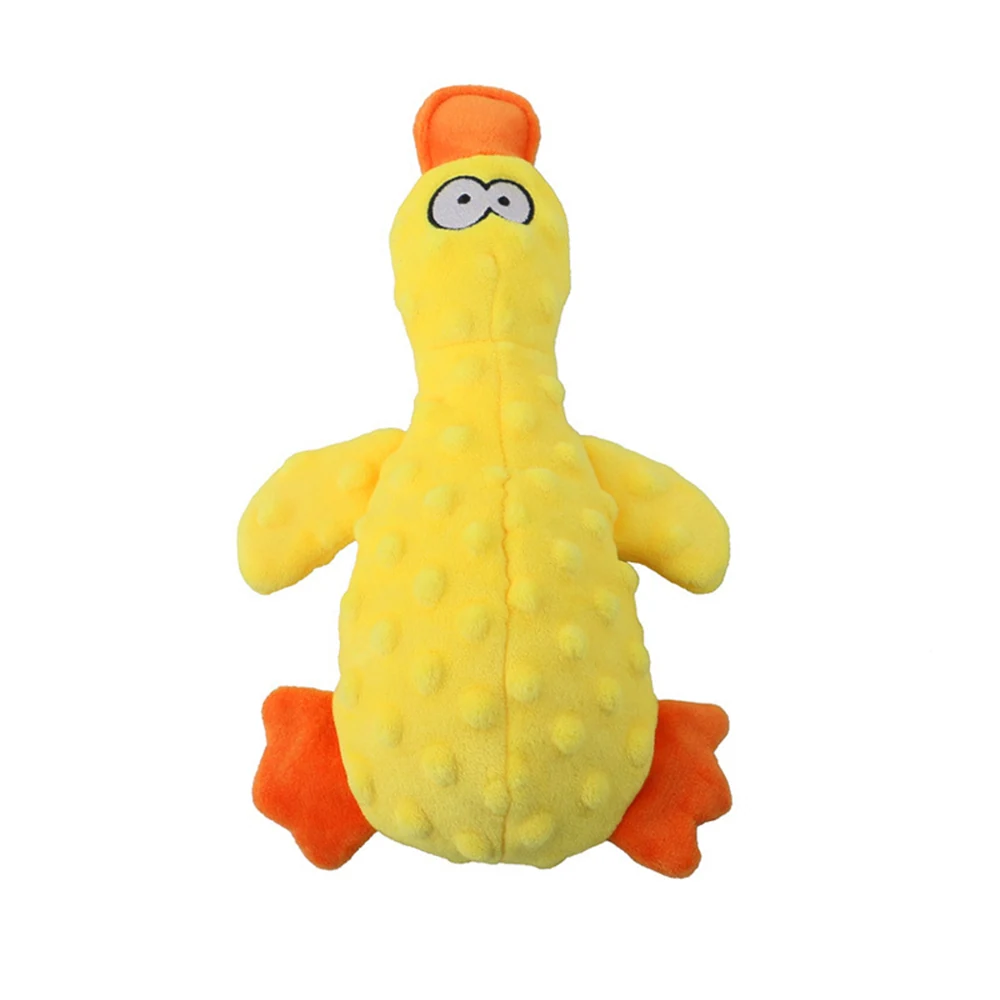 Yellow plush toy duck with orange beak and feet and textured body