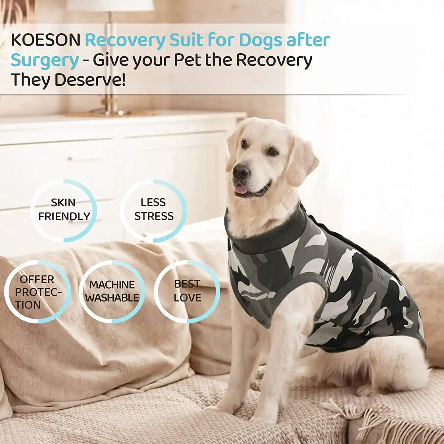 A golden retriever wearing a camouflage dog recovery suit while sitting on a beige couch.