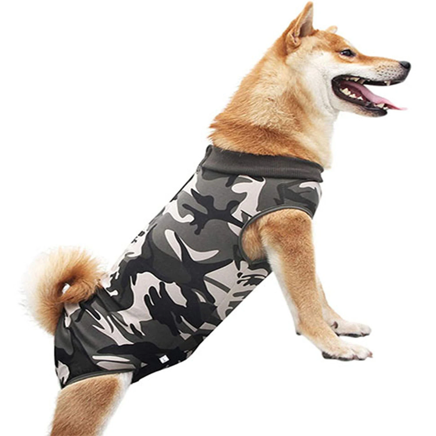 Side profile of a Shiba Inu dog wearing a gray and black camouflage patterned sleeveless shirt.