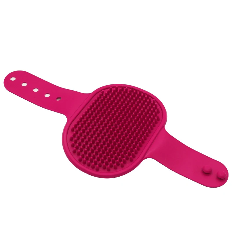 Pink silicone scrub brush with two adjustable straps and textured surface
