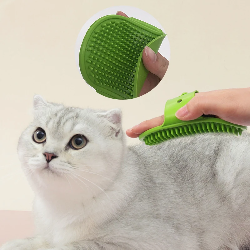 A person uses a green silicone grooming brush on a white cat, with an inset showing the brush's texture.
