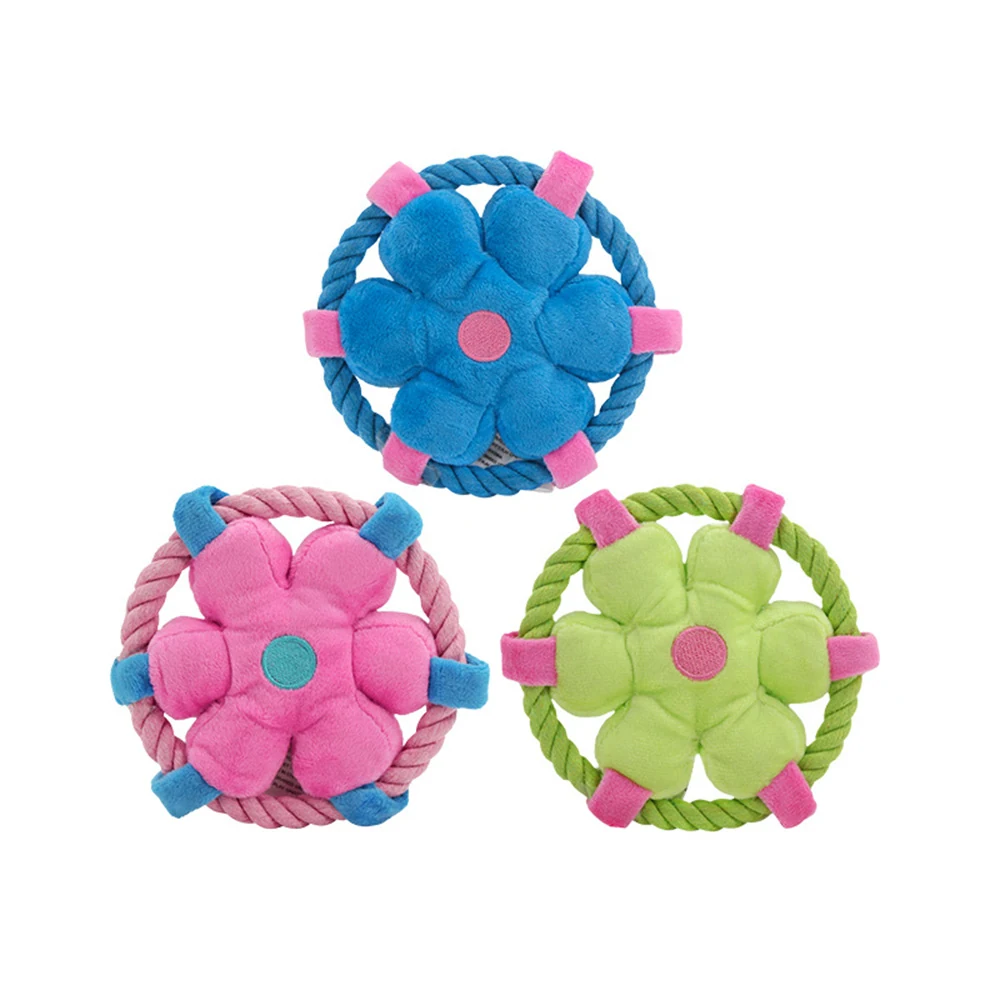 Three flower-shaped rope pet toys in blue, pink, and green arranged on a white background