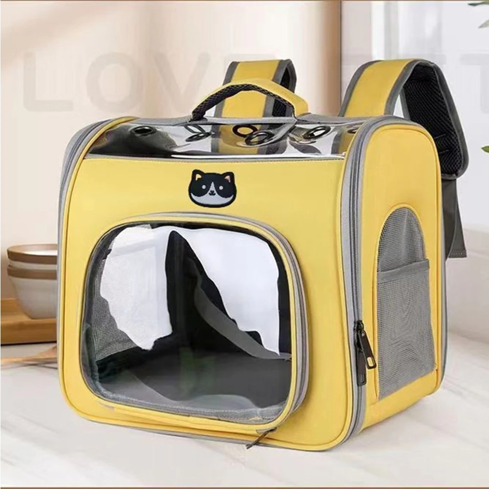Yellow pet carrier backpack with a clear dome window and mesh side panels.