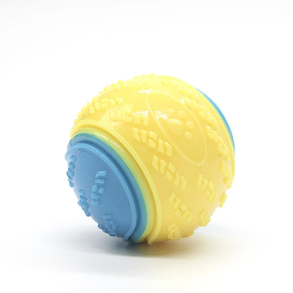 Yellow and blue textured spherical object with embossed paw prints.