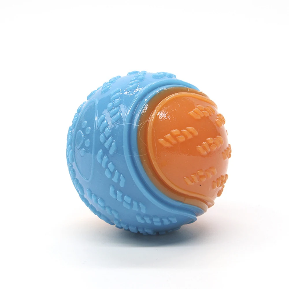 Blue and orange textured rubber ball on a white background