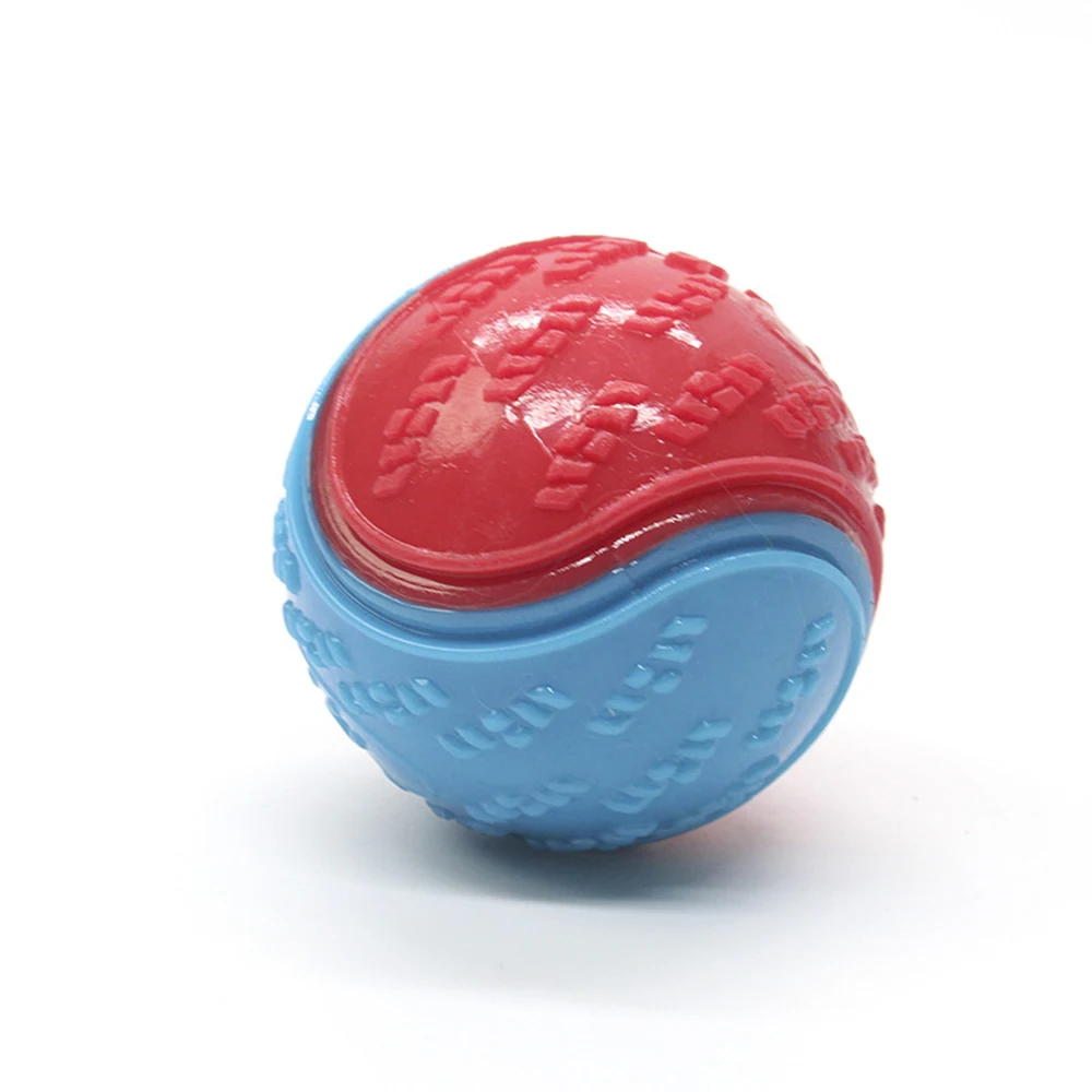 Red and blue two-tone rubber ball with textured surface on a white background
