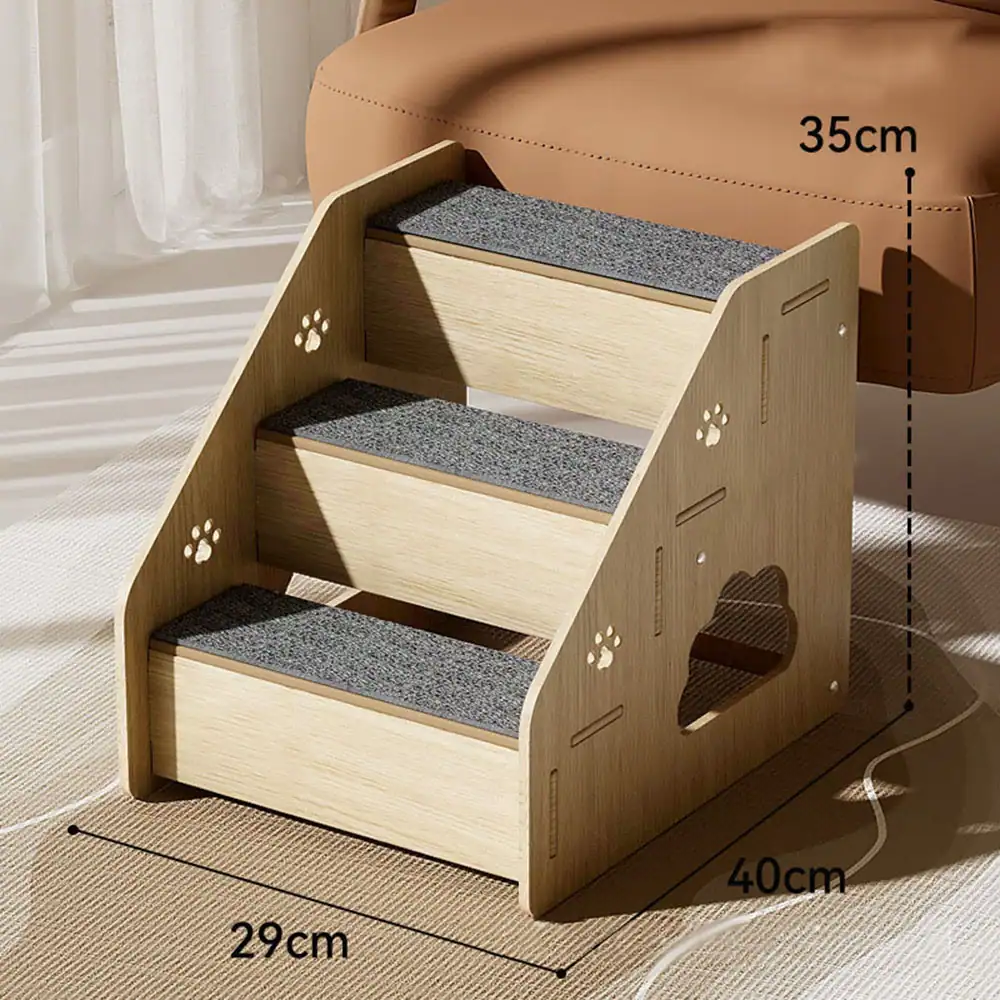 Light wooden pet stairs with three grey carpeted steps and paw print cutouts, shown with dimension markings.