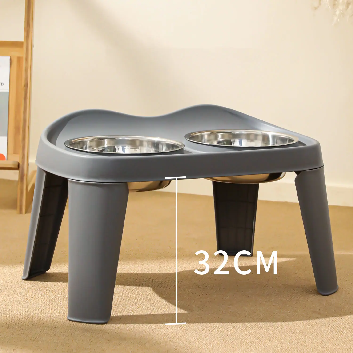 Grey elevated dog bowl stand with two stainless steel bowls and a 32cm height measurement overlay.