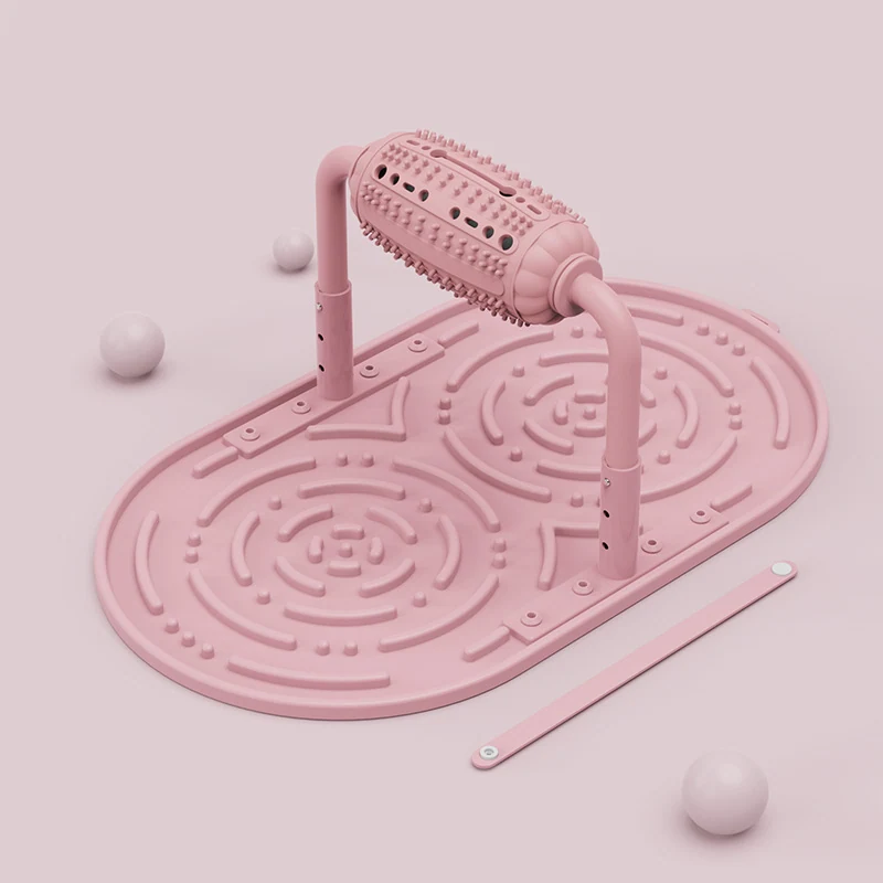 Pink 3D rendered foot massage roller and textured balance board set with loose spheres.