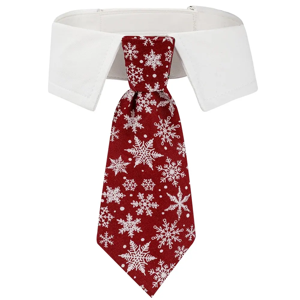 Red necktie with white snowflake pattern displayed on a white shirt collar