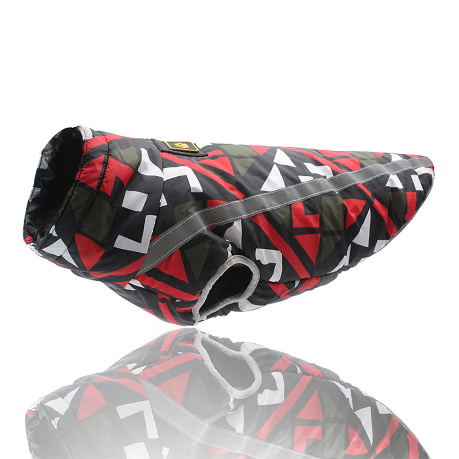 Red, black, and white geometric patterned dog coat with a reflective gray stripe.