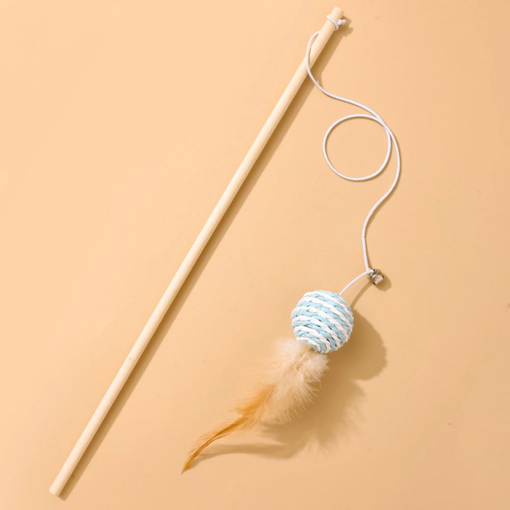 A wooden cat wand toy with a string, a blue and white ball, and feathers on a solid background.