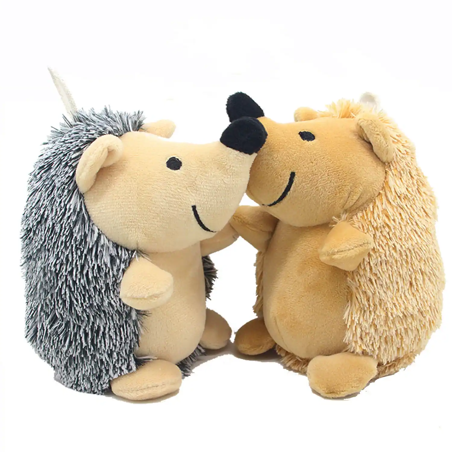 Two plush hedgehog toys, one gray and one tan, standing face-to-face against a white background.