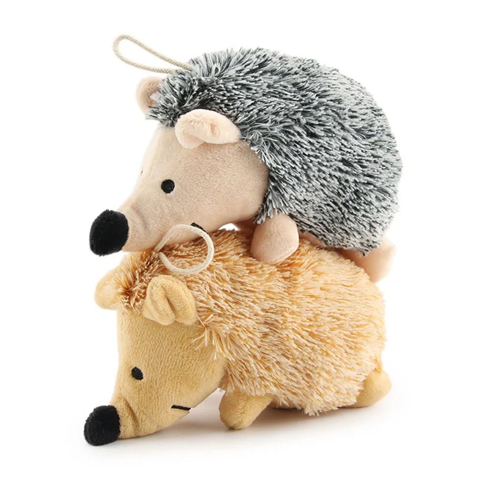 Two plush hedgehog keychains stacked on top of each other against a white background