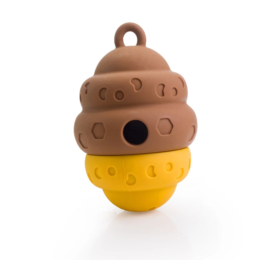 Brown and yellow silicone toy with a loop handle and textured surface