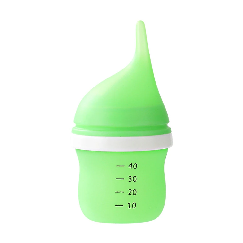 Green silicone baby food feeder or bottle with volume markings 10-40