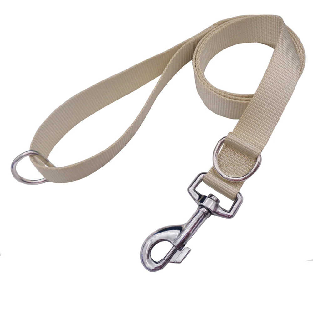 Beige nylon lifting strap with metal rings and hook on white background