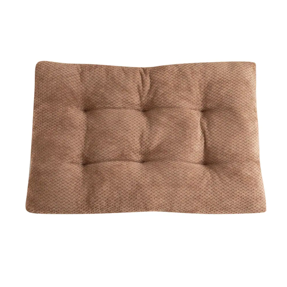 A rectangular brown tufted cushion on a white background.