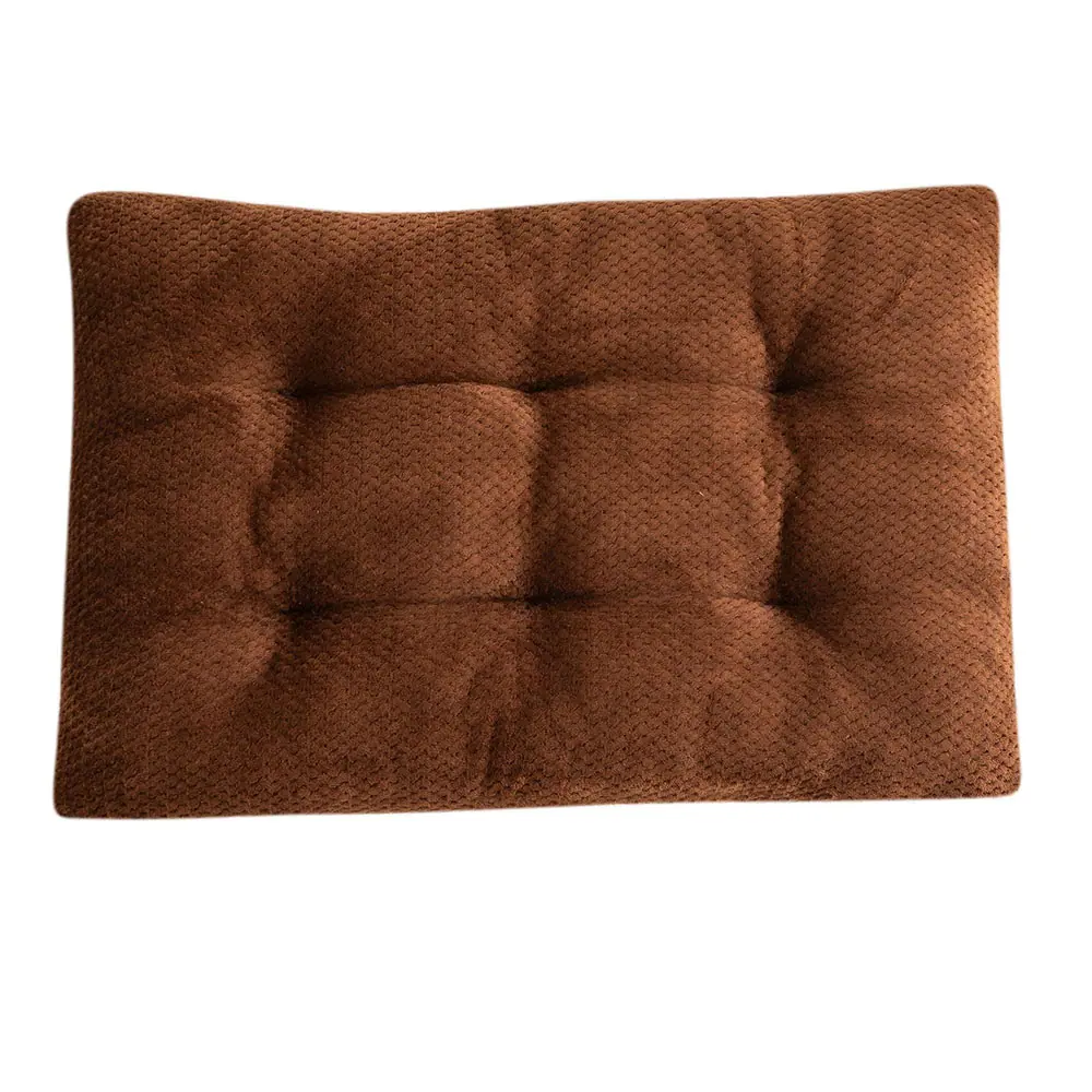 A brown, tufted rectangular cushion with a textured fabric surface.