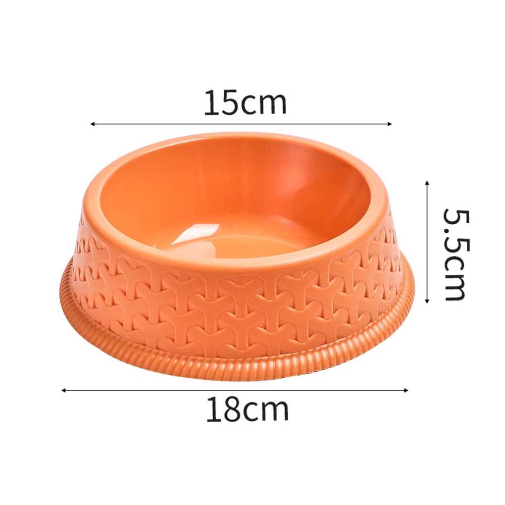 Orange plastic pet bowl with textured sides and a ribbed base, displayed with measurement lines indicating its dimensions.